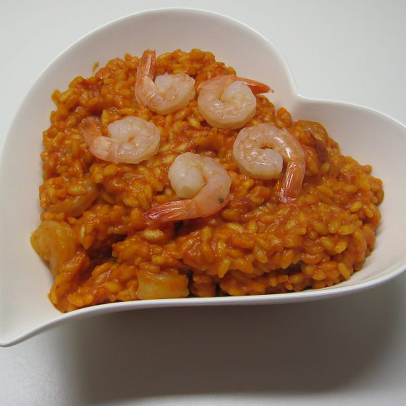 Pilaf rice with prawns and Colonna arancio oil